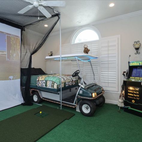 The Queen bed is made from an actual golf cart! The bedroom has a 10' golf simulator, Golden Tee machine, and more.. Boys Golf Bedroom, Golf Bedrooms For Boys, Golf Bedroom Ideas, Golf Bedroom, Airbnb Furniture, Golf Furniture, Home Golf Simulator, Beachy Head, Golf Room