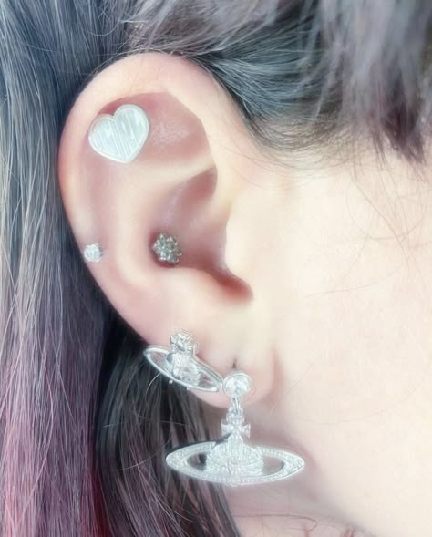 cute alt earrings igirl vivienne westwood Nose Piercing Ideas, Alt Earrings, Jewelry Vivienne Westwood, Vivienne Westwood Earrings, Vivienne Westwood Jewellery, Cool Ear Piercings, Pretty Ear Piercings, Cool Piercings, Jewelry Tattoo