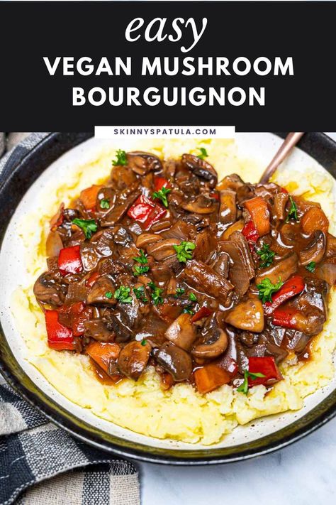 A mushroom lover’s delight, this vegan mushroom bourguignon is rich, flavourful, and super easy to make. Red wine and thyme add depth to this creamy vegan bourguignon made with a mix of porcini and button mushrooms. Serve it over mashed potatoes for an uncomplicated yet satisfying weeknight dinner. #mushroombourguignon #veganbourguignon #veganmushroomstew Vegan Bourguignon, Vegan Mushroom Bourguignon, Mushroom Bourguignon, Red Wine Recipe, Over Mashed Potatoes, Vegan Mashed Potatoes, Mushroom Stew, Vegan Mushroom, Veggie Dinner