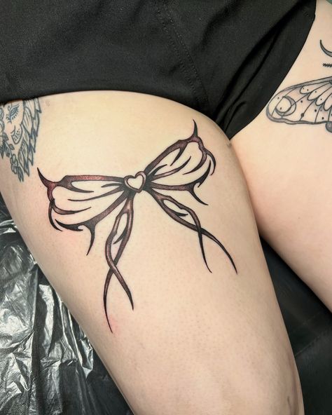 This cyber bow 🎀 done the other day Thanks @eightfoldstudio for helping me with the shading- you da best! Xx #tattoo #cybertattoo #bowtattoo #njtattoo #njtattooartist Thigh Bow Tattoo Women, Gothic Garter Tattoo, Xx Tattoo, Bows Tattoos For Women Thighs, Heart Thigh Garter, Bow Tattoo Thigh, Corset Tattoo, Thigh Garter Tattoo, Thigh Garter