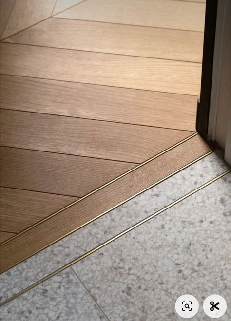 Wood Floor To Wood Tile Transition, Entryway Floor Transition, House Corridor Design Entryway, Transition From Wood To Tile Floor, Brass Floor Transition, Transition Tile To Wood Floor, Gold Floor Transition Strip, Tile To Wood Transition Doorway, Tiles And Wood Floor Transition