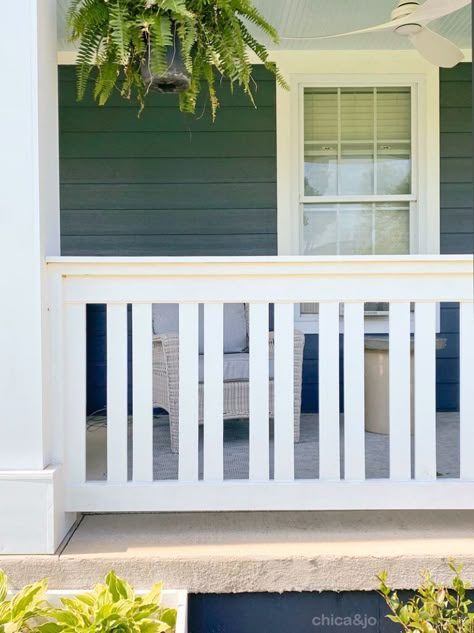 Modern porch railing design | Chica and Jo Porch Railing Update, Exterior Wood Stair Railing Ideas, Small Front Porch Railing Ideas Craftsman Style, Coastal Porch Railing Ideas, Diy Patio Railing, Cottage Porch Railing, Wood Railing Front Porch, Front Porch Fence Ideas, Front Porch Gate Ideas