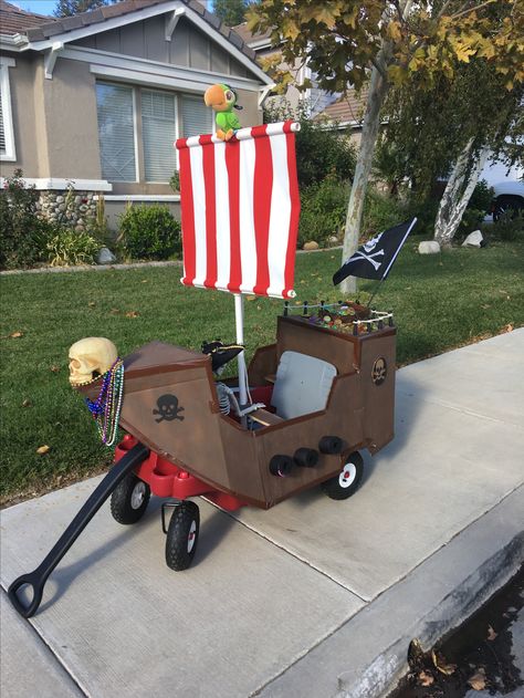 Wagon Pirate Ship Pirate Wagon Diy, Diy Family Pirate Costumes, Pirate Costume For Toddler Boy, Baby Pirate Costume Girl, Wagon Pirate Ship Diy, Diy Pirate Ship Wagon, Pirate Ship Wagon Halloween, Diy Toddler Pirate Costume, Toddler Pirate Costume Diy