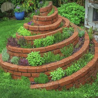 The Herb Gardener: How to Make an Herb Spiral Brick Herb Garden, Spiral Garden Bed, Spiral Brick Garden, Superbowl Party Decorations, Charcoal Kitchen, Herb Spiral, Spiral Garden, Brick Garden, Stone Lantern