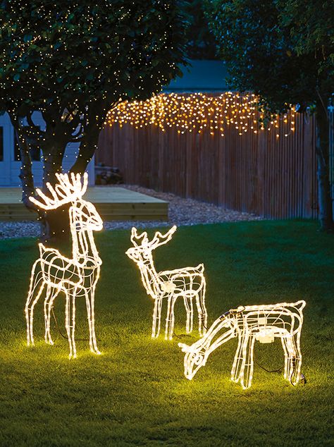 Create a striking outdoor display with reindeer silhouette lights, complete with bright LED bulbs. Available at Homebase, these reindeer lights have simple shapes with magnificent antlers – and some even nod their heads! Outdoor Christmas Light Displays, Glitter Reindeer, Christmas Garden Decorations, Christmas Light Displays, Deer Decor, Christmas Yard Decorations, Yard Decorations, Christmas Yard, Christmas Garden