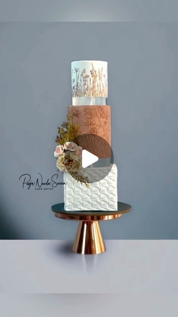 Pooja Nanda Sareen on Instagram: "Wedding Engagement Cake
Tutorial
Sharing a video tutorial of a cake I did recently in white and rose gold using different techniques and textures.
.
.
Products used-
Mesh stencil @caking_it_up 
Rose gold fondant @sugarshineindia
Ribbon Ruffles mold @marvelousmolds 
Acrylic disc @omkraft_cakedecor 
White texture mould @moleeks_cakehouse 
White fondant @magiccoloursindia
Anti skid mat @nycake 
.
.
.
Acrylic spacers @omkraft_cakedecor
#cakevideo #caketutorial #weddingcake #whitecake #rosegoldcake #engagementcake #cakeoftheday #cake #cakesofinstagram #bakersofinstagram #delhibakers #bakersofindia #oddlysatisfying #confiteria #cakedesign #sugarfanciesbypooja #caketrends" Wedding Cake Tutorial Videos, Rose Gold Fondant, Cake Tutorial Videos, Gold Fondant, Wedding Cake Tutorial, White Fondant, Rose Gold Cake, Engagement Cakes, Cake Trends