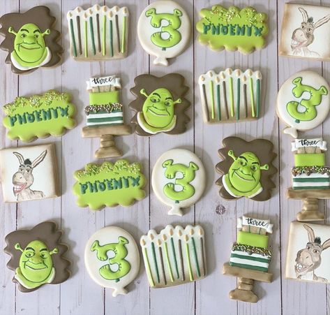 Utah Custom Sugar Cookies’s Instagram photo: “Shrek!!!! Who doesn’t love him and his best friend Donkey?!? This was such a fun set to make for a cute 3 year olds birthday party today. 🥳…” Shrek Decorated Cookies, Shrek Sugar Cookies, Shrek 3rd Birthday Party, Shrek Cookies Decorated, Shrek 2nd Birthday Party, Shrek First Birthday Party, Shrek Cookies, Shrek Birthday Party Decorations, Shrek Themed Birthday Party