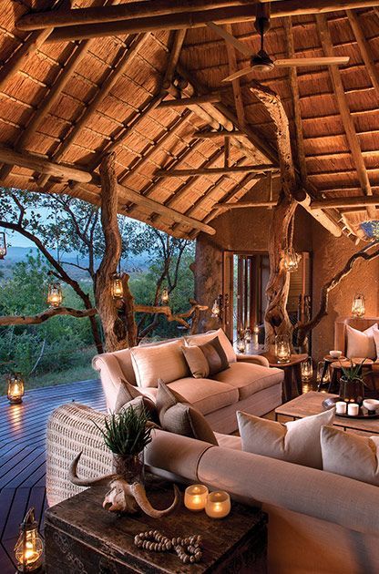 Lose the thatch and wood - simple beige couches and rustic lodge / velt decorations. Safari Lodge Interior, African Lodge, Lodges South Africa, Bush Lodge, Lodge Ideas, Lodge Design, Glamping Resorts, African Interior, Game Lodge