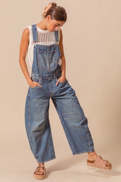 Barrel Leg Overalls Outfit, High Rise Denim Jumpsuit With Pockets In Utility Style, Medium Wash Relaxed Fit Bib Front Jeans, Utility Denim Bib Front Bottoms, Utility Denim Bottoms With Bib Front, Casual Dark Wash Overalls, Medium Wash Relaxed Fit Denim Jumpsuit With Bib Front, Relaxed Fit Denim Jeans With Bib Front, Relaxed Fit Bib Front Denim Jeans