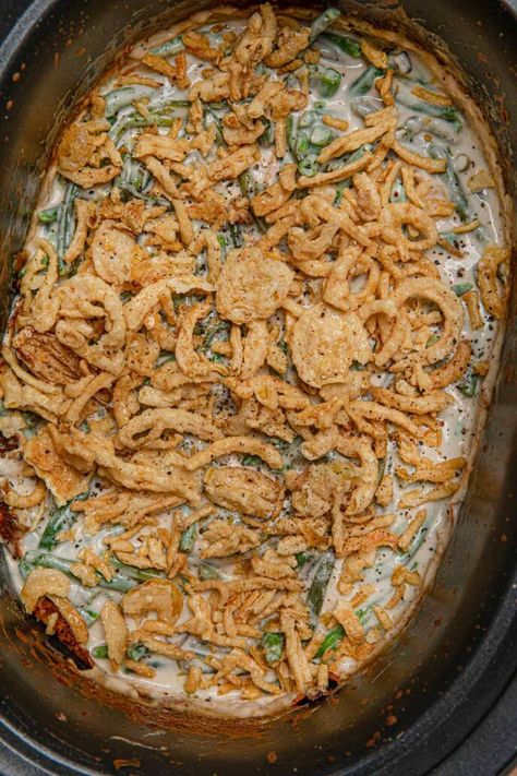 Slow Cooker Green Bean Casserole is a classic holiday creamy side dish with mushroom soup topped with crispy onions. Save the oven space and no dry green beans! #greenbeans #greenbeancasserole #holiday #christmas #thanksgiving #sidedish #holidayrecipe #dinnerthendessert Green Bean Casserole Crockpot, Overnight Turkey Recipe, Casserole Slow Cooker, Casserole Crockpot Recipes, Slow Cooker Green Beans, Slow Cooker Pot Roast, Green Beans Side Dish, Vegan Green Bean Casserole, Dinner Then Dessert