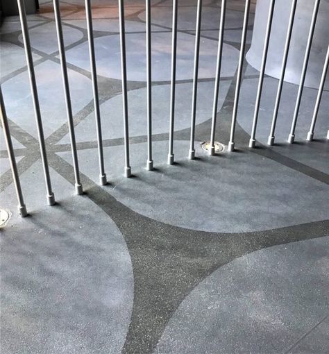 Stenciled Concrete Lobby Greets Guests with Striking Visuals | Concrete Decor Concrete Stencil, Atrium Garden, Stencil Concrete, Printed Concrete, Crazy Paving, Concrete Stained Floors, Floor Stain, Floor Trim, Concrete Table