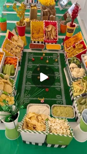 Shannon Doherty on Instagram: "EASY SUPER BOWL SNACK STADIUM 🏈 who do you think will be in the big game?? This is the ONLY way to host your football party this year! Full material list- - 4 Soda Boxes - Wrapping Paper in your teams colors - Decorative straws, paper bags and team stickers - aluminium foil tray - team color cups - turf field for center - snacks - streamers COMMENT - LINKS - I will send you links to everything you need to make this snack stadium party this year and full directions! FOLLOW ME @athomewith.shannon for more super simple ideas that everyone will love and everyone can do! I am determined to make every gathering at your house a moment that you will always remember! #superbowlparty #superbowl #footballparty #snackstadium #footballdiy #superbowlstadium" Football Stadium Snack Display Easy, Super Bowl Party Food Stadium, Super Bowl Food Stadium, Snack Stadium Super Bowl, Super Bowl Stadium, Super Bowl Snack Stadium, Super Bowl Snack, Superbowl Party Games, Snack Stadium