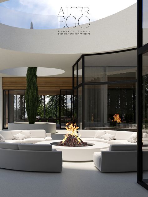 Outdoor fireplaces are becoming increasingly popular in ultra-modern dream homes. The warm glow of the fire and the sleek modern design of the home combine to create a unique atmosphere of relaxation and luxury. ALTER EGO Project Group is the best internationally acclaimed design firm. It is dedicated to creating world-class luxury projects around the globe and has earned the most prestigious design awards. Modern Fireplace Indoor Outdoor, Luxury Outdoor Fireplace, Rooftop Fireplace, Contemporary Outdoor Fireplaces With Tv, Indoor / Outdoor Fireplace, Asymmetrical Modern Outdoor Fireplace, Robin House, Modern Outdoor Fireplace, Luxury Fireplace