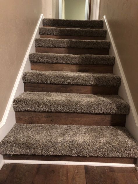 Flooring is Barnwood from Sam’s Club and carpet on the stairs. I love it! Hardwood Floors With Carpeted Stairs, Diy Carpeted Stairs Makeover, Carpet Wrapped Stairs, Stair Redo, Rec Room Remodel, Installing Carpet, Stairs Remodel, Wooden Floors Living Room, Redo Stairs