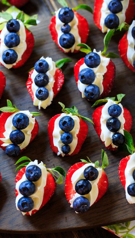 Red, White, and Blue Cheesecake Strawberries make a healthier 4th of July dessert. Red White And Blue Cheesecake, Blue Cheesecake, Blue Strawberries, Cheesecake Strawberries, Memorial Day Desserts, 4th July Food, Patriotic Desserts, 4th Of July Desserts, Fourth Of July Food