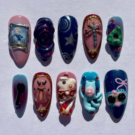 coraline 💙🐈‍⬛🎪 I had so much fun recreating the tiny painting ☺️ ib @starlightnail_s . . . #pressonnails #pressonnailbusiness #halloweennails #coraline #coralinenails #3dnailart #nailart #naildesign #handpaintednailart Coraline Nails Acrylic, Weirdcore Nails, Coraline Nail Designs, Painting Nails Ideas, Coraline Nails Art, Caroline Nails, Disney Theme Nails, Cosmetics Table, Button Nails