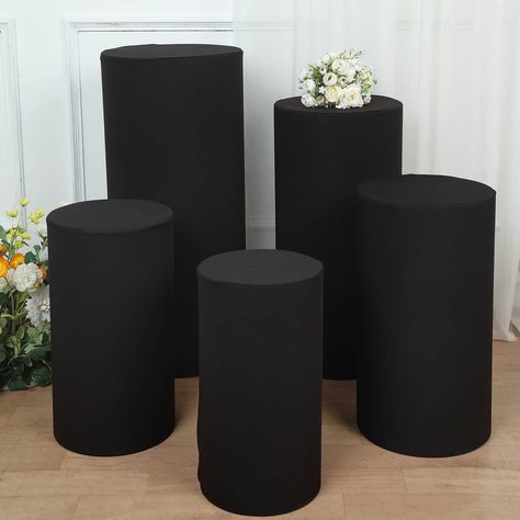 PRICES MAY VARY. Quantity: Set of 5 Display Stands Covers Material: Spandex Color: Black Cover Sizes: S: 19.5"H x 11"W M: 21.5"H x 12"W L: 23.5"H x 12.5"W XL: 29.5"H x 14"W XXL: 35.5"H x 16"W Thickness: 160 GSM Use it with our Set of 5 Acrylic Cylinder Plinth Display Box Stands Features: Lightweight, pullover cover to get a snug fit, easy to slip on and take off PREMIUM QUALITY: These Display Box Stand Covers are made from a high-quality spandex material with shiny glittered. This elegantly shim All Black Party, Bday Dinner, Mall Stores, 50th Bday, Pedestal Stand, Acrylic Display Stands, Up Theme, Media Stand, Display Stands