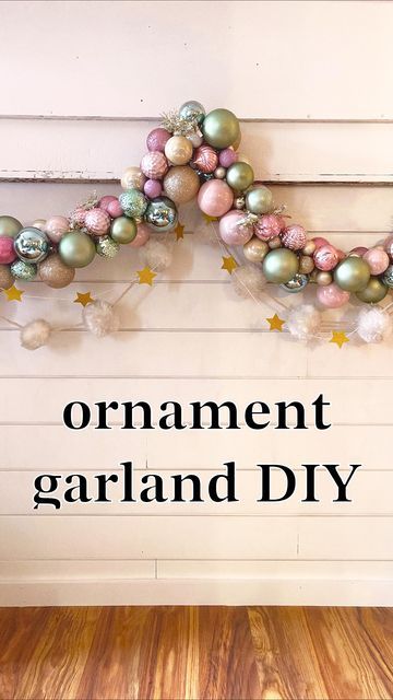 Anna ✨ on Instagram Diy Tinsel Garland, Ornament Ball Garland, Diy Ball Garland Christmas, Diy Ribbon Garland Christmas, How To Decorate With Tinsel Garland, Tinsel Garland Decorating Ideas, Ornament Garland Doorway, Christmas Ornament Garland Diy, Diy Ornament Garland Christmas Balls