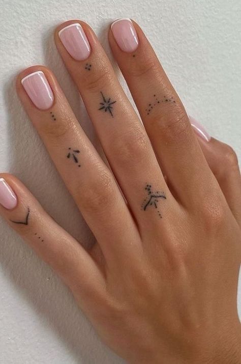 Finger Tattoos Women Simple, Ethereal Finger Tattoos, Smiley Face Finger Tattoo With Friend, Small Hand Finger Tattoos, Greek Finger Tattoo, Aesthetic Finger Tattoos For Women, Cute Finger Tattoos For Women Simple, Minimalistic Hand Tattoos For Women, Tiny Thumb Tattoos