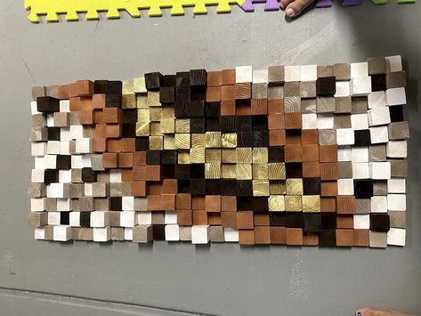 I wanted to create a wall art which is easily made using spare wood. It can be used to decorate any space in your home. Here’s how we made it: You will need many 2x2 blocks of different heights. I used 1.25, 1.5in, 1.75in and 2in blocks. For this get 2x2s and cut them using a miter saw. Now, arrange the blocks in a pattern that you like on a quarter inch plywood. There is no specific pattern, just put them randomly and see if you like it. Next, select some spray paints with col… Art Assignments, Spray Paints, 3d Abstract, Miter Saw, Block Wall, We Made It, Wall Cladding, The Blocks, Wooden Art