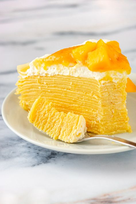 Mango Crepe Cake Recipe Mango Crepe Cake Recipe, Mango Crepe Cake, Mango Foods, Yellow Cake Recipes, Lemon Cake Pops Recipe, Cake Crepes, Foods For Parties, Mango Filling, Mango Crepe