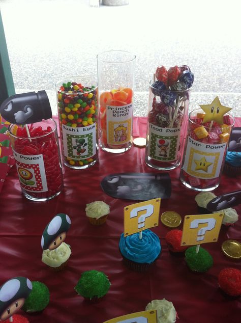 Mario candy bar Mario Themed Candy Bar, Mario Birthday Candy Table, Mario Candy Table Ideas, Super Mario Bros Candy Table, Mario Themed Candy, Super Mario Candy Table Ideas, Mario Snacks Food Ideas, Mario Candy Table, Mario Snacks