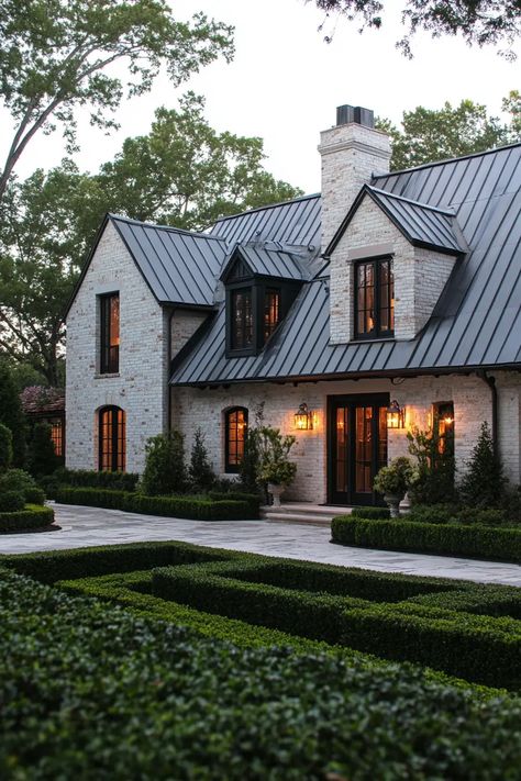 Effortlessly Chic: 40 French Country Homes You’ll Want to Move Into | VIVA White Brick Tudor House Exterior, French Country Stone Exterior, French Cottage Homes Exterior, Brick Farmhouse Exterior Country Homes, German Schmear Brick House, Brick Stone House Exterior, White Stone Exterior House, French Ranch Style Homes, French Cottage House Exterior