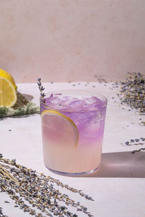 Lavender Lemonade Recipe - The Boozy Ginger Lavender Haze Drink, Lavender Lemonade Recipe, Purple Lemonade, Lavender Drink, Unique Cocktail Recipes, Lavender Cocktail, Honey Lemonade, Purple Drinks, Culinary Lavender