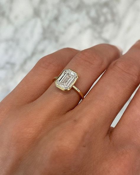 Eye-Catching Emerald Cut Engagement Rings ★ emerald cut engagement rings gold simple classic diamond Flush Fit Engagement Ring, Square Art Deco Engagement Ring, Low Setting Emerald Engagement Ring, Organic Looking Engagement Rings, Flush Ring Setting, Minimal Vintage Engagement Ring, Embossed Engagement Ring, Prongless Engagement Ring, Bevel Emerald Diamond Ring