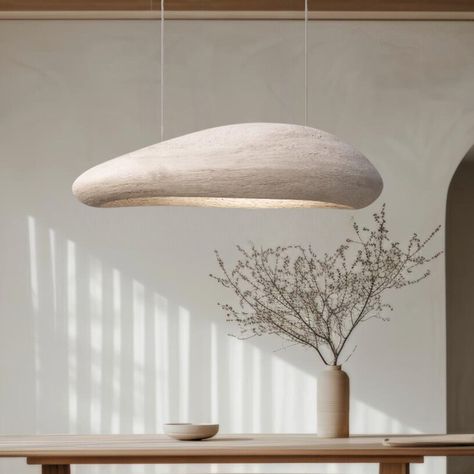 Illuminate your modern dining space or kitchen with our Large Wabi Sabi Pendant Light. Inspired by the natural beauty of Wabi Sabi design, this pendant light features an organic shape crafted from gentle synthetic resin. Its unique design is perfect for making a statement in your home, adding a touch of contemporary elegance to any room. With easy installation, this handcrafted piece is sure to become a focal point of conversation. Elevate your decor with our artisanal lighting fixture that embo Wabi Sabi Lighting, Wabi Sabi Dining, Wabi Sabi Lamp, Wabi Sabi Design, Sustainable Decor, Rattan Pendant Light, Inspire Me Home Decor, Scandinavian Decor, Organic Modern