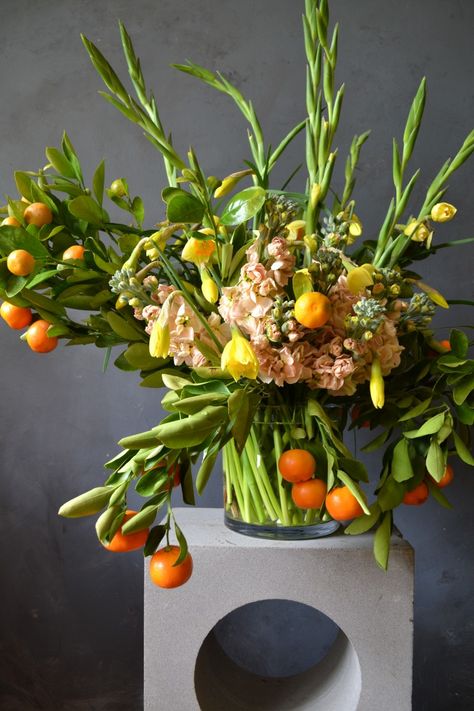 An arrangement in a glass vase in all peaches, yellows and oranges. Winter Arrangements, Gladioli, Table Arrangement, Vase Arrangements, Late Winter, Winter Flowers, Daffodils, Extra Large, Vase