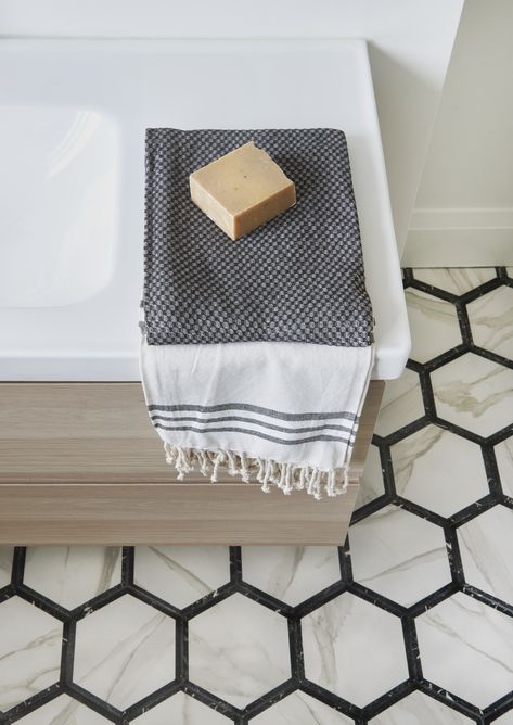 Designing a hive of elegance with these faux-marble hexagonal honeycomb tiles to create a bathroom abuzz with style 🐝🖐️🎤 

Design: Black Sheep Interior Design
Photo: Stephani Buchman
Tile: Olympia Tile Honeycomb Tiles, Olympia Tile, Tile For Bathroom, Honeycomb Tile, Tiles For Bathroom, Interior Design Photos, Silver Birch, Faux Marble, Design Photo