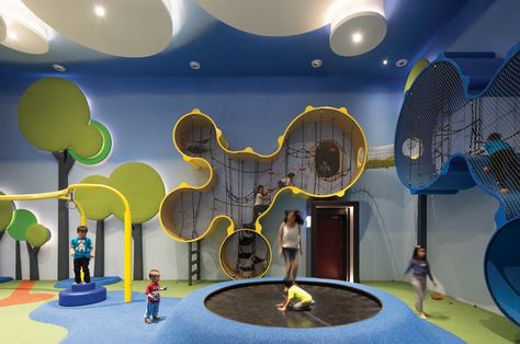 The Wall-o-lla play structure with tube slide connection to the screening area with regular entrance door below. Children's Play Area, Kids Cafe, Kids Indoor Playground, Playground Design, Play Spaces, Kids Zone, Kids Area, Kids Play Area, Indoor Play