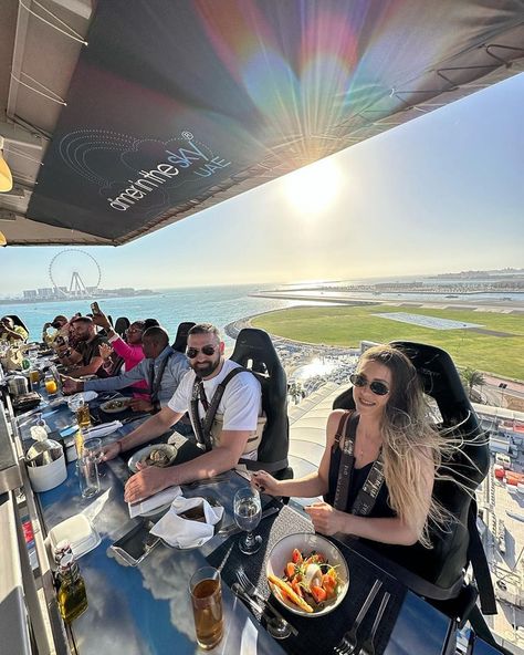 Elevate Your Dining Experience! Join us for Dinner in the Sky Dubai 🌆✨. Buckle up for an unforgettable journey through the clouds, with gourmet cuisine that will leave you speechless. 🍽️ Reserve your seat in the sky today! . . . . . . . . . . . . . . . . . . . . . . . . #vootours #vootourstourism #uae #visituae #discoveruae #dubai #whatsondubai #visitdubai #dinnerinthesky #dinnerintheskydubai #dubailuxury #travelinspiration #skyhighdinner #dinnerwithaview #elevatedining Dinner In The Sky Dubai, Dubai Skydiving, Img World, Sky Dubai, Atlantis Aquaventure, Dinner In The Sky, Vision Board Examples, Dubai Aesthetic, Vision Board Images