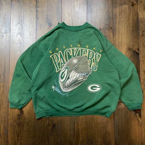 Vintage 1990s Green Bay Packers NFL American Football Crewneck Sweatshirt / see measurements for sizing  Pit to Pit:      24" Length:      25" Sleeve:      28" No tag size, fits around a XL.  Please check the measurements before purchasing  -------------------------------- ⚠️ Please Note: All of our items are vintage. Please note that with vintage clothing, items may show some signs of wear. We do our best to include as much information about the items condition as possible. Please look carefully through the photos and feel free to reach out to us if you would like more information or additional photos. All of our items are washed and arrive ready to wear (except deadstock with tags). Feel free to message us about any questions! Follow us on Instagram to keep up with our newest releases an Football Crewneck, Rare Clothing, Nfl Packers, Football Sweatshirt, Green Bay Packers, Nfl Football, Green Bay, American Football, Fast Fashion