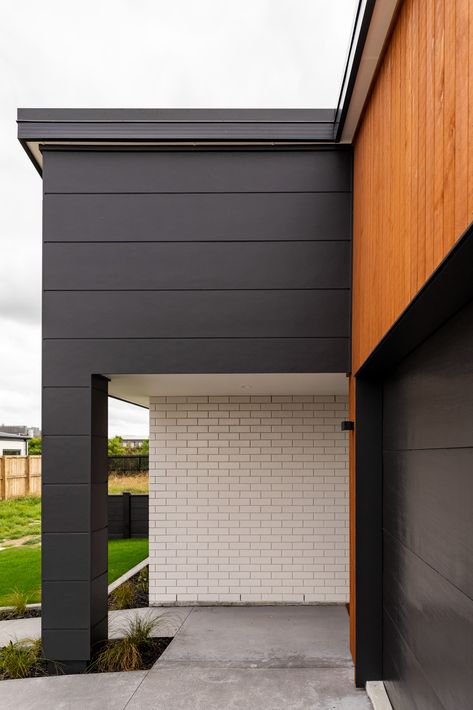 Our stunning new Rototuna / Kinfields Show Home features a mix of exterior claddings - Shiplap (vertical), James Hardie Stria (horizontal) and Modus White Brick. We love this look!  #generationhomesnz #exteriorcladding #newhome #showhome #rototunavillage #kinfields James Hardie Stria, Shiplap Vertical, Stria Cladding, Cypress House, 3 Bedroom House Plan, House Cladding, James Hardie, Home Board, Exterior Cladding