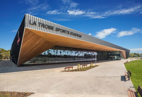 The La Trobe Sports Stadium is based at La Trobe University’s Bundoora campus. The new state of the art facility was part of La Trobe’s $150 million Sports Park development – a key component of the University’s ambitious $5 billion University City of the Future plan to transform Melbourne’s north. Melbourne Architecture, Sport Park, Sports Stadium, Architecture Images, Australian Architecture, Sports Complex, Education Architecture, Higher Education, Walking Tour