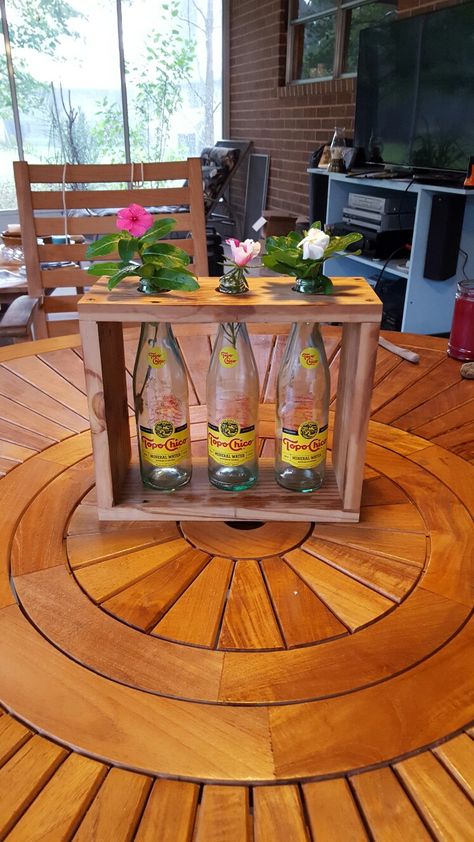 Topo chico Bottle centerpiece what did you do today Glass Bottle Decor, Recycled Decor, Bottle Centerpieces, Bottle Diy, Glass Bottle Diy, Diy Cans, Diy Recycle, Diy Planters, Wine Bottle Crafts