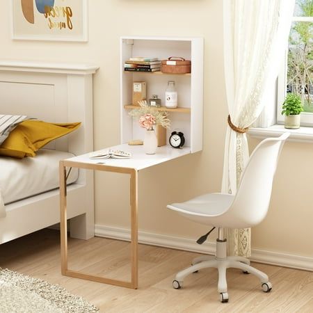 This foldable desk will be the perfect eye-catching addition to your limited space. It is painted in creamy white and after folding it appears the blackboard.This desk will be the perfect eye-catching addition to your limited space. It is painted in creamy white and after folding the black back is trimmed with white edge. The clean lines create a stylish and minimalist style, ideal for decorating a bedroom, living room, study or office. Before installing the desk on the wall, unfold the desk aga Folding Wall Desk, Wall Mounted Desk Folding, Shelves For Office, Floating Wall Desk, Fold Up Desk, Girls Bedroom Green, Wall Mounted Computer Desk, Chest Of Drawers Decor, Wall Mounted Folding Table