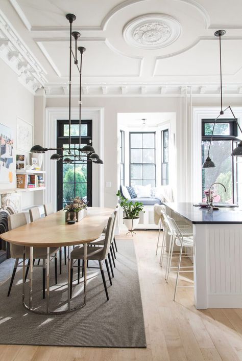 Louisa Roeder, a designer for Homepolish, became her own client when she found the townhouse of her dreams in Prospect Heights. The Chatwin Dining Table feels right at home here. Brownstone Interiors, New York Brownstone, Brooklyn Brownstone, Classic Kitchen, Elegant Kitchens, Room Table, Moldings And Trim, Dining Room Table, Home Interior