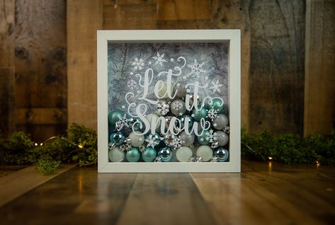 "Let it snow ~ This beautiful Christmas shadow box will be a great addition to your holiday home décor. Perfect for a fireplace mantle, wall or other surface in your home. This white shadow box is filled with mini ornaments and and a snowy background . Front of the glass says \"let it snow\" Give a personalized gift that will last a lifetime! This is perfect for baby showers, gender reveals, home decor, birthday, anniversaries, holidays or special occasions. If the Rush Order Fee is not applied on check-out, we will be shipping the order out as per our delivery policy ORDER PICK-UPS:  Please message us for a coupon to waive shipping. We are located in Deerfield Beach, Florida." Home Decor For Christmas, Barnyard Theme, Christmas Shadow Boxes, Decor For Christmas, Christmas Gift For Mom, Mini Ornaments, Cricut Designs, Secret Santa Gift, Christmas Decorations For The Home