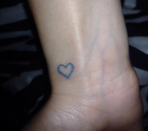 Blue heart wrist tattoo. My boyfriends favorite color. Blue Heart Tattoo, Heart Wrist Tattoo, Heart Outline Tattoo, Blue Ink Tattoos, Tattoo Cover Ups, Love Heart Tattoo, Wrist Tattoo Cover Up, Feminine Skull Tattoos, Heart Tattoo Wrist