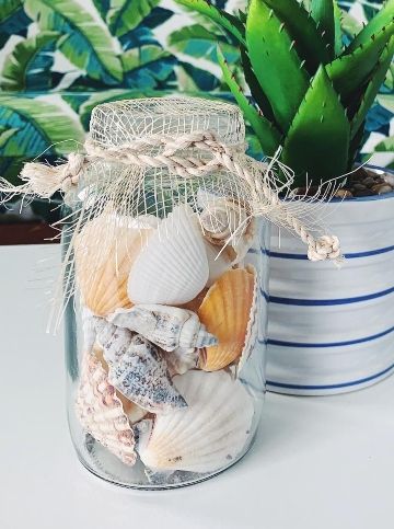 How to Organize & Display Shells in Glass Jars Displaying Shells, Seashell Jar, Beach Jar, Display Shells, Decorative Glass Jars, Jar Display, Coastal Christmas Decor, Small Glass Jars, Jar Decor