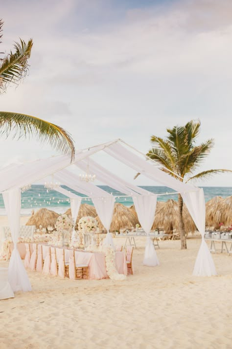 Wedding reception on the beach in the Dominican Republic. Destination wedding at the Hard Rock Punta Cana Resort. Glam wedding reception on the beach. Pink and gold beach wedding.  #destinationwedding #beachwedding #glamwedding #puntacana Glam Wedding Reception, Hard Rock Punta Cana Wedding, Elegant Beach Party, Pink Beach Wedding, Gold Beach Wedding, Beach Wedding Pink, Hard Rock Punta Cana, Destination Wedding Reception, Dominican Republic Wedding