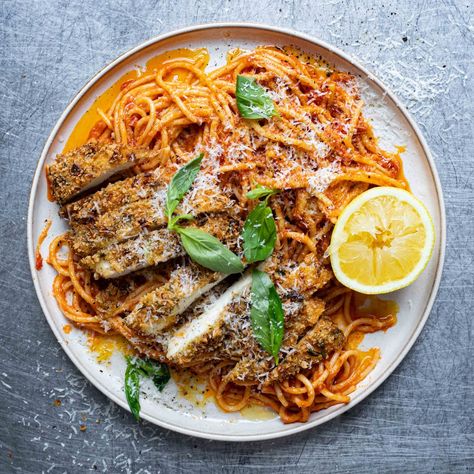 Chicken Milanese, Comfort Pasta, Green Pasta, Spicy Tomato Sauce, Chicken Nugget, Weekday Meals, Parmesan Pasta, Crispy Onions, Citrus Chicken