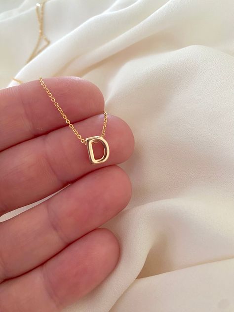 **Each piece in my shop, I personally create and photograph. (All photos are property of The Cord Gallery LLC) Thank you for supporting my small business. Tiny Gold Initial Necklace -  Gold Filled Now all Gold Filled - Waterproof!! Add a personal touch to your accessories collection with this Dainty Gold Initial Necklace!  Features a 18k Gold Filled Mini Initial Letter. Each letter is 3D for added interest and texture and hangs seamlessly on your choice of Gold Filled Link or Gold Filled Box cha Letter Necklace Initials, Letter Charm Necklace, Gold Initial Necklace, Gift Idea For Women, Padlock Necklace, Initial Necklace Gold, Waterproof Jewelry, Jewelry Lookbook, Chain Extenders