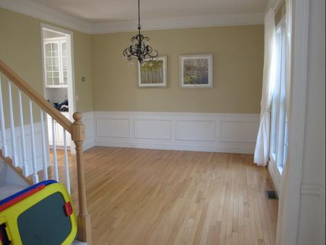 My dining room is the same color and has the same wainscoting. What window tx's to do? White? Gold? Hmm.... Benjamin Moore Putnam Ivory, Putnam Ivory Benjamin Moore Living Rooms, Putnam Ivory, Ivory Paint, Benjamin Moore Colors, Front Door Colors, Paint Colour, Kitchen Paint, Door Color