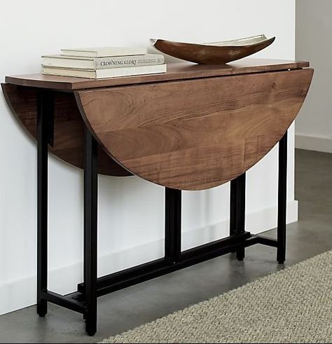 A great solution for small spaces or multifunctioning rooms, this unique drop-leaf oval table unfolds its updated look in black metal and beautifully grained acacia wood. Lift the leaves and pull out the center gateleg on each side to instantly turn the slim, compact console into a dining room table. A great staple for small spaces or multifunctioning rooms, the Origami Drop Leaf Dining Table is a Crate and Barrel exclusive. #crateandbarrelideas #entrywaydecor #entrywayideas Vintage Drop Leaf Table, Dining Table Small Space, Kitchen Table Centerpiece, Staircase Wall, Drop Leaf Dining Table, Casa Vintage, Drop Leaf Table, Oval Table Dining, Leaf Table