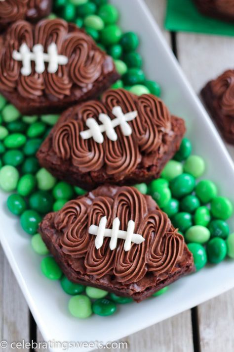 Frosted Football Brownies - Brownies frosted with chocolate and vanilla… Super Bowl Treats Dessert Recipes, Football Brownies Super Bowl, Football Desserts Easy Super Bowl Party, Game Day Food Desserts, Game Day Desserts Football, Brownie Footballs, Superbowl Party Food Ideas Desserts, Easy Superbowl Desserts, Desserts Superbowl