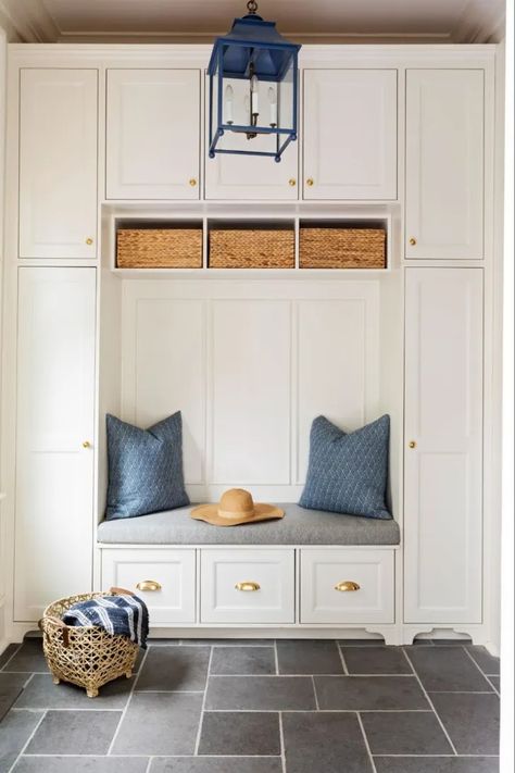 15 Clever Mudroom Ideas That Are Equally Functional and Stylish | Apartment Therapy Entry Cubbies, White Built In Cabinets, Mudroom Cubbies With Bench, Gray Tile Floor, Mudroom Built Ins, Built In Mudroom, Foyer Cabinet, Cubby Ideas, Mudroom Cubbies